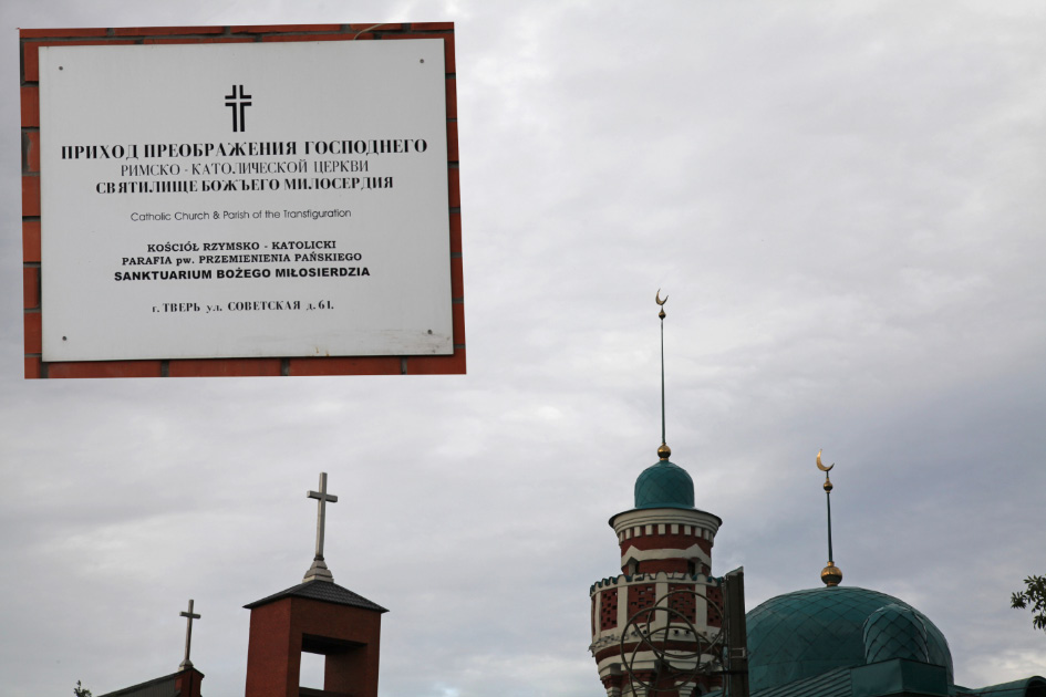 Unfortunate neighbors in Tver on Soviet Street: Catholic Church, Muslim mosque and Jew-Bolshevism's star and hypocritical wheat ears.